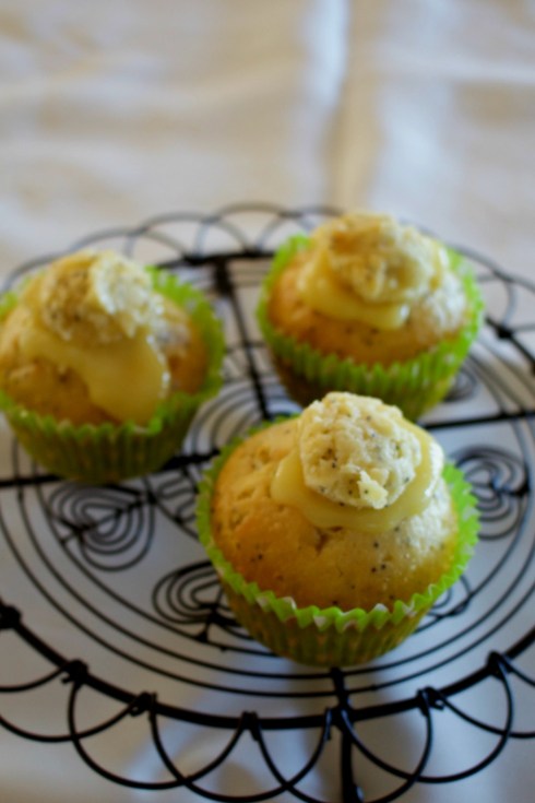 lemon poppyseed cupcakes with lemon curd.